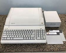 Image result for Apple IIe with Floppy Drive