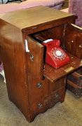 Image result for Old Phone On a Cabtet