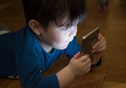 Image result for Kid Glued to Phone