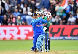 Image result for Dhoni Playing Cricket
