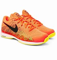 Image result for Bright Neon Yellow Orange Nike Shoes