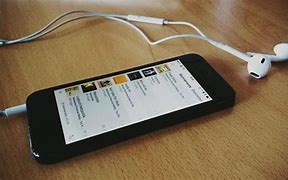 Image result for A Cool Picture of a iPhone with Headphones On
