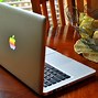 Image result for Circle around the Apple Logo in MacBook