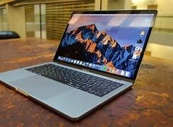 Image result for Battery Logoon MacBook Pro