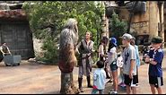 Chewbacca and Rey playing hide and seek at Disneyland Star Wars Galaxy’s Edge
