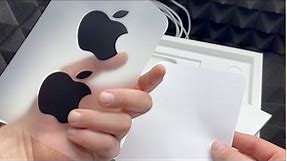 What Apple Logo Stickers does the MacBook Pro M2 come with?