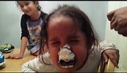 Little girl cries because of the cake