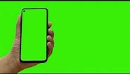 green screen with hand holding cell phone