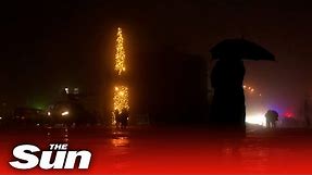 Ukrainians visit wartime Christmas tree installed in downtown Kyiv