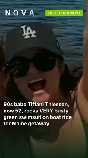 90s babe Tiffani Thiessen, now 52, rocks VERY busty green swimsuit on boat ride for Maine #shorts