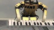 Piano-playing robot