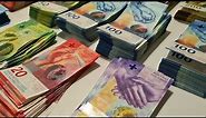 100,000 CHF in cash. Swiss money counting.