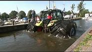 Mitas tyres helped 4-tones tractor float like a boat in deep water.