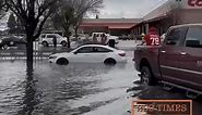 A truck helps rescue three young girls who were stranded in a flooded car in the parking lot of Costco on Hammer Lane. #stockton | 209 Times