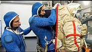 Astronaut Demonstrates How A Space Suit Works