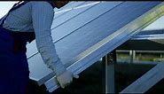 Men Installing a solar panel | Free Stock Video.