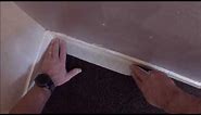How to apply masking tape between carpet and skirting boards like a pro