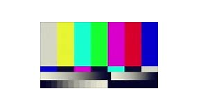 Color bars on a TV monitor without signal. Noisy and distorted.