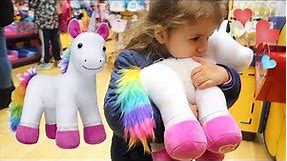 Shopping for UNICORN Plush at Build-A-Bear Toy Store