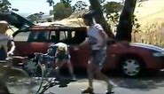 Tour Down Under 2002- Michael Rogers gets a bike from a spectator