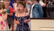 Little Girl Does a Hilarious Dance During Graduation Ceremony Performance - 1042048