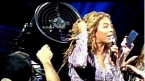 BEYONCE HAIR WEAVE GETS STUCK IN A FAN AT CONCERT DURING "HALO"