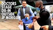 Doctors forcibly removed outside JP Morgan offices | Canary Wharf | Extinction Rebellion UK