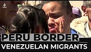 Venezuelan migrants demand to be let across Peruvian border
