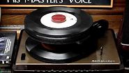 RCA 45 record player 1954 & Montage of 1950's and early 1960's hits stacked 15 high