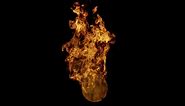 Download Fire ball with free space for text. Fireball on a black background, close-up. Background Fire Visual Effect. for free