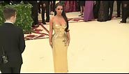 Kim Kardashian goes gold at Met Gala