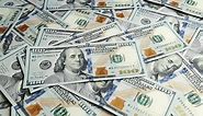 Premium stock video - Close up american one hundred dollar banknotes wallpaper
