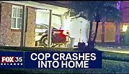 Titusville police car crashes into residential garage