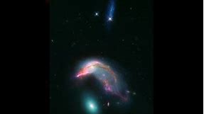Galaxy Duo Looks Just Like a Penguin (NGC 2336) Guarding Its Egg (NGC 2937) : ARP-142