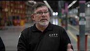 Crown’s Infolink® System Improves Safety Compliance and Fleet Utilization at City Furniture