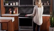 GE Profile 30 in. 5 Burner Smart Freestanding Double Oven Gas Range in Black Stainless with Air Fry PGB965BPTS