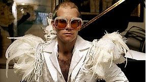 Elton John's Outfits Through the Years