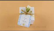 How to Decorate a Plain White Favor Box with a Blue Periwinkle Flower Gift Tag
