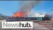 Fire at waste facility sends huge clouds of smoke billowing across Auckland | Newshub