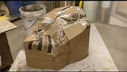 Make fake rock using cardboard covered with cement
