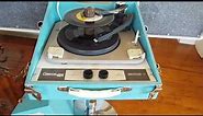 Decca Stereo record player playing a stack of 45 RPM records.