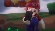 Mario looking at what's on his phone & walking away sad