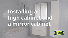 Installing a high cabinet and a mirror cabinet