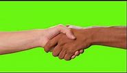 Copyright free green screen video | hands of two people shaking hands on a green background