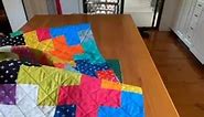 To square up the quilt before binding, I use a large square ruler for the corners and a long rectangular ruler for the sides. #quilting #brokenriverquilts | Broken River Quilts