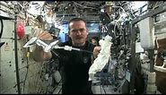 Wet Washcloth In Space - What Happens When You Wring It? | Video