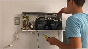 Replacing large batteries in emergency light unit