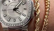 Patek Philippe Nautilus White Gold Diamond Bezel Ladies Watch 7010G Wrist Roll | SwissWatchExpo