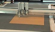 Cutting and creasing corrugated cardboard
