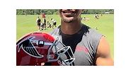 Atlanta Falcons players react to red helmet